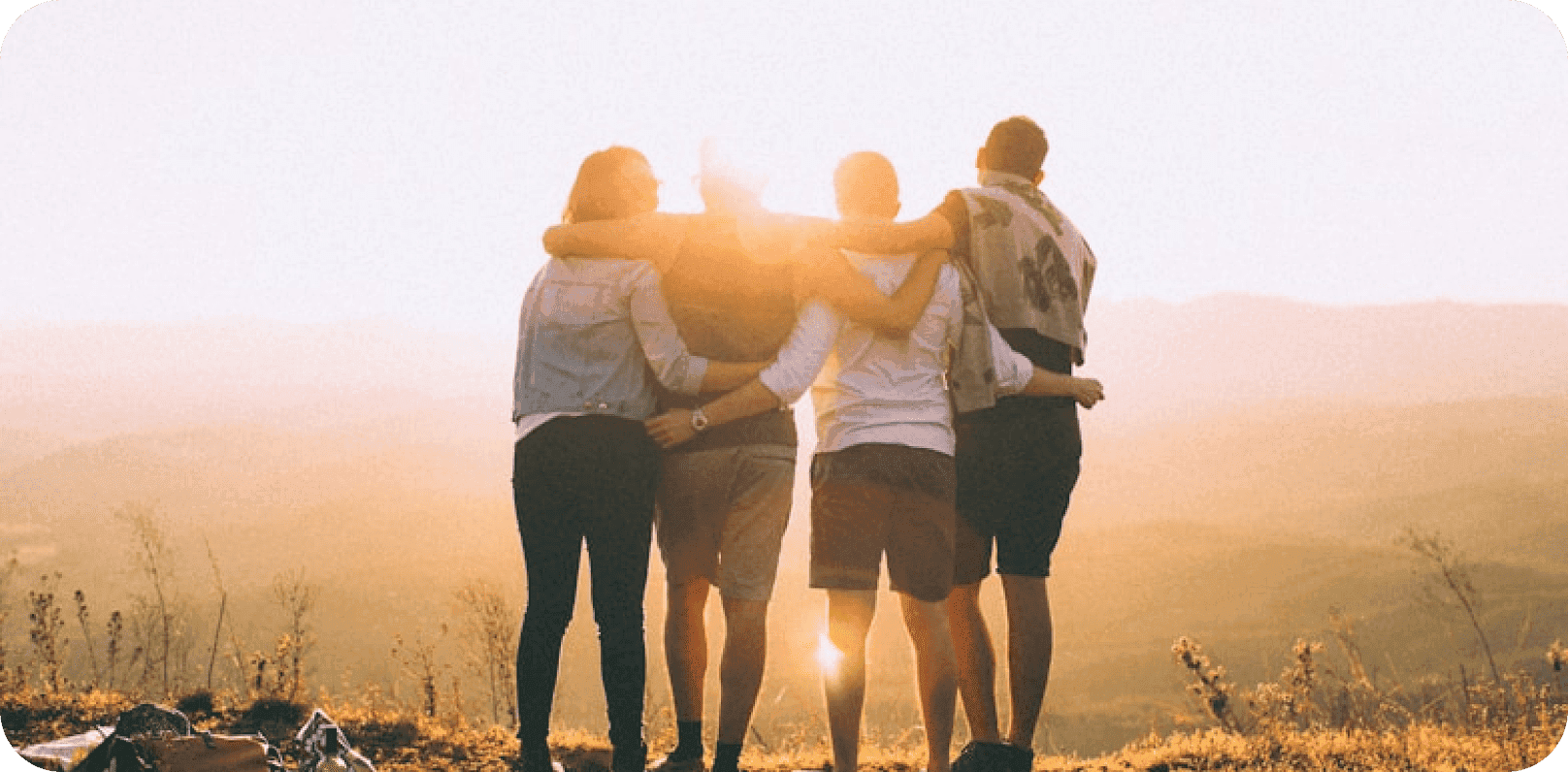 People hugging outdoors
